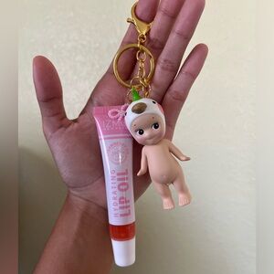 Macaw sonny angel & lip oil keychain